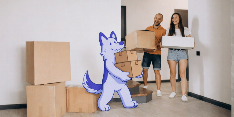 Pareja entrando a su nuevo departamento con cajas de mudanza
